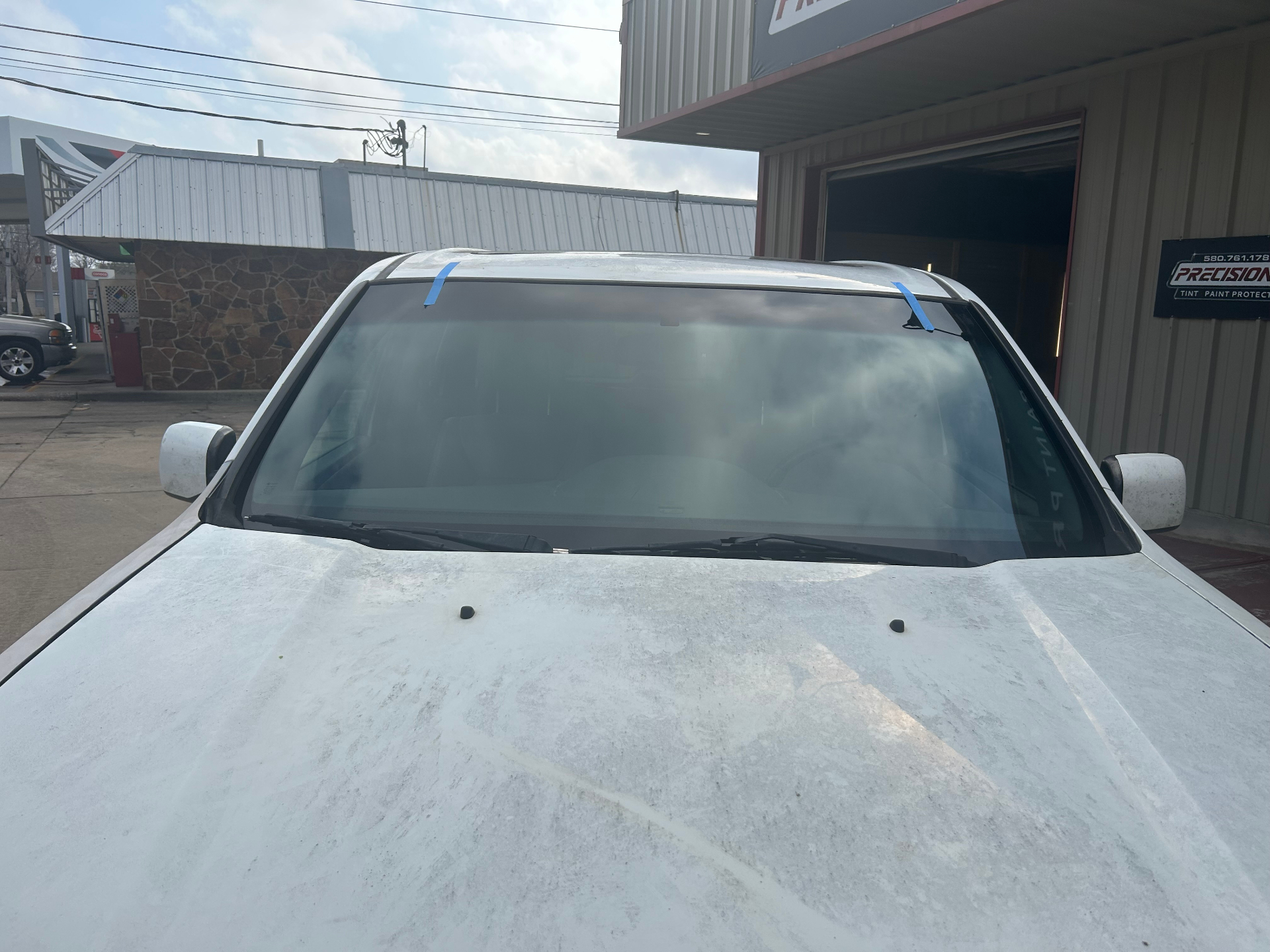 Freshly installed windshield on a customer vehicle after auto glass replacement in Ponca City